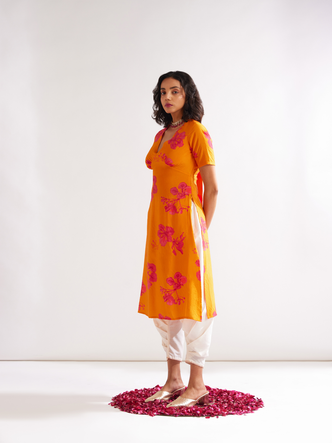Gulmohar back tie-up kurta Paired with side pleated dhoti- Spicy Orange