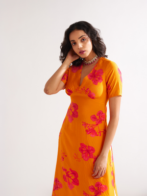Gulmohar back tie-up kurta Paired with side pleated dhoti- Spicy Orange