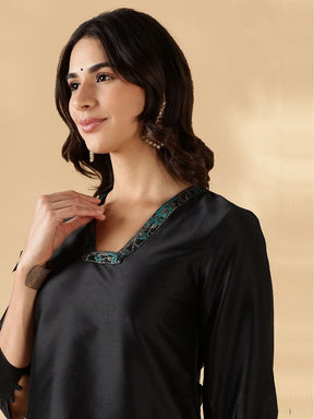 High-low kurta with broad straight pants with brocade details