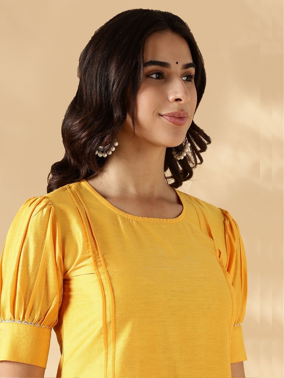 Bright yellow solid round neck  kurta pant set with short puff sleeves