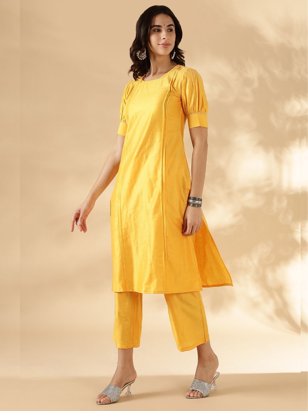Bright yellow solid round neck  kurta pant set with short puff sleeves
