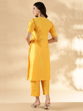 Bright yellow solid round neck  kurta pant set with short puff sleeves