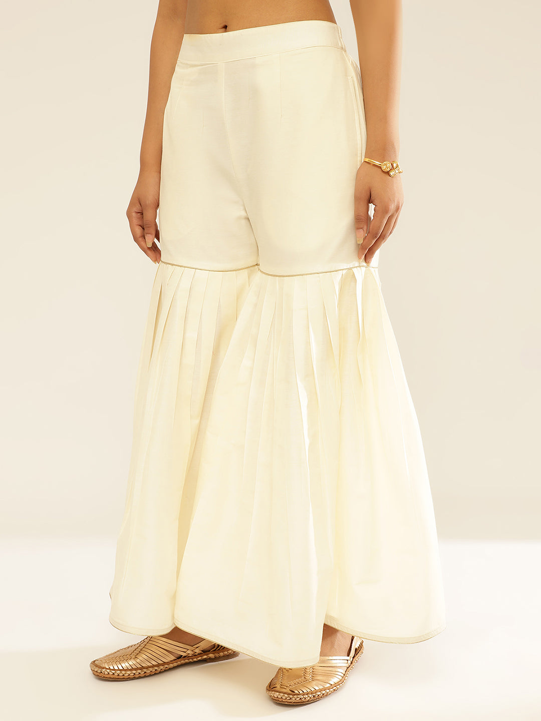 Buy Women Ochre Foil Tiered Sharara Pants - Feed-Bottoms - Indya