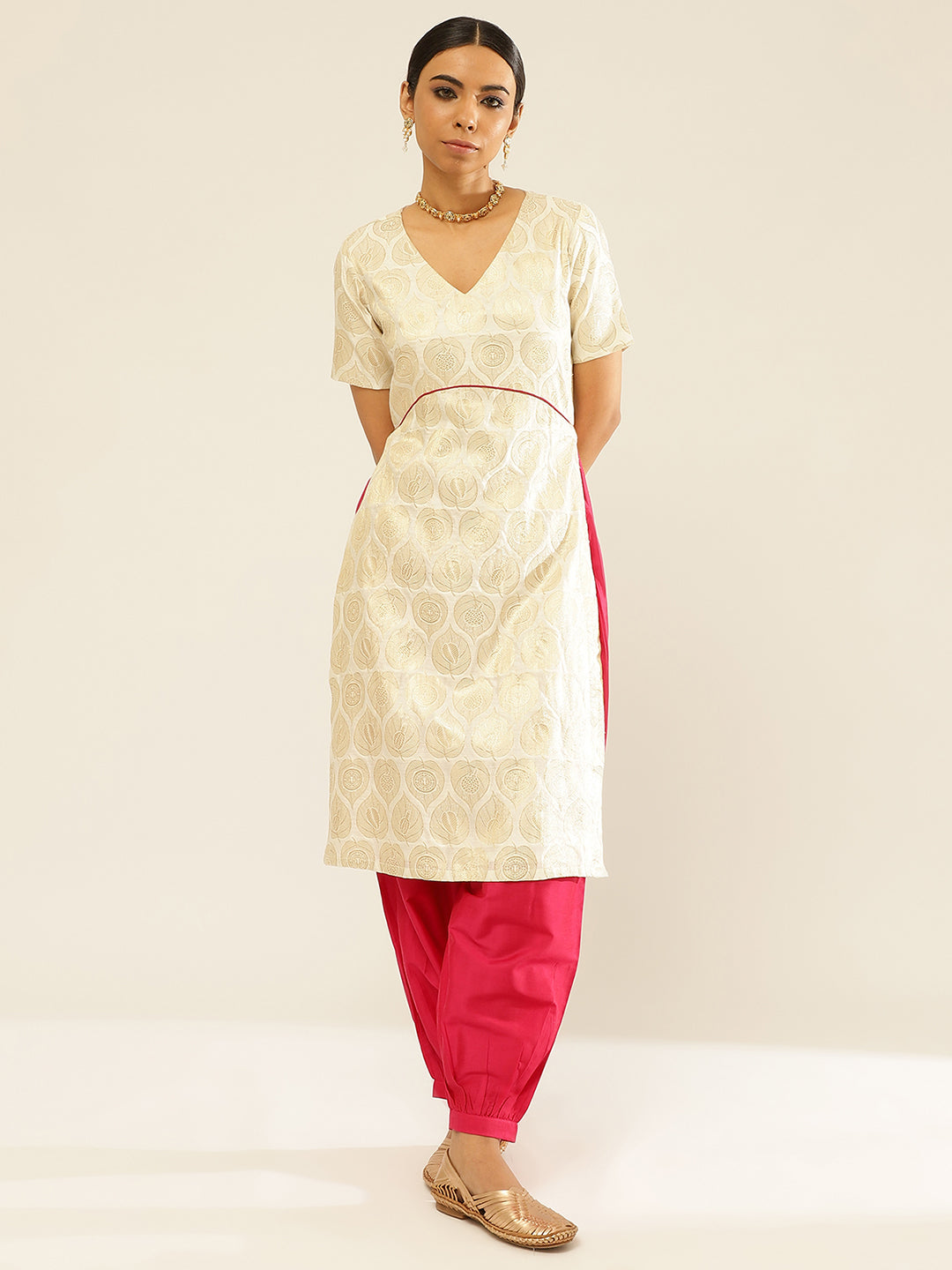 Banarasi zari kurta with U-waistline paired with pathani pants
