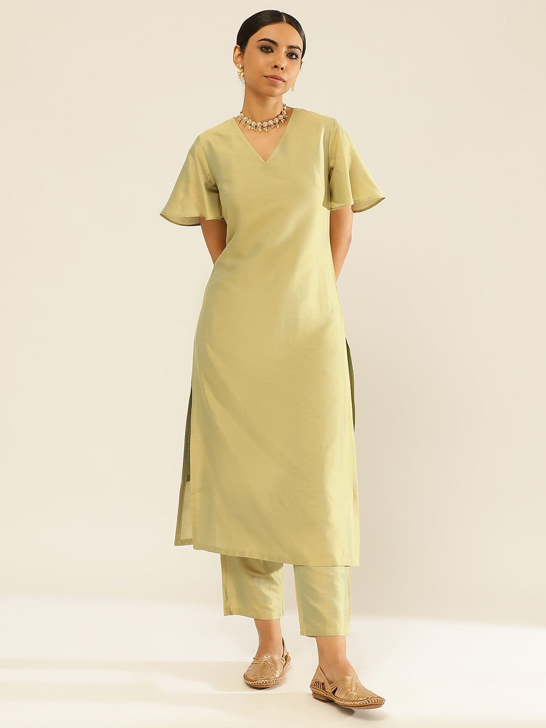 Solid color straight kurta with bell sleeves paired with straight pants