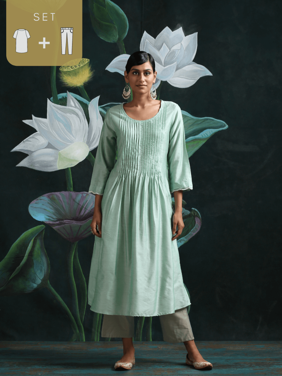 Cotton silk pleated flared kurta with detailed sleeves and pockets, along with straight bottoms Green