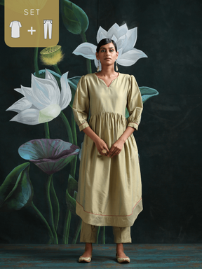 Cotton silk gathered kurta with U-hemline and contrast piping & facing, along with pleated pants Sage Green