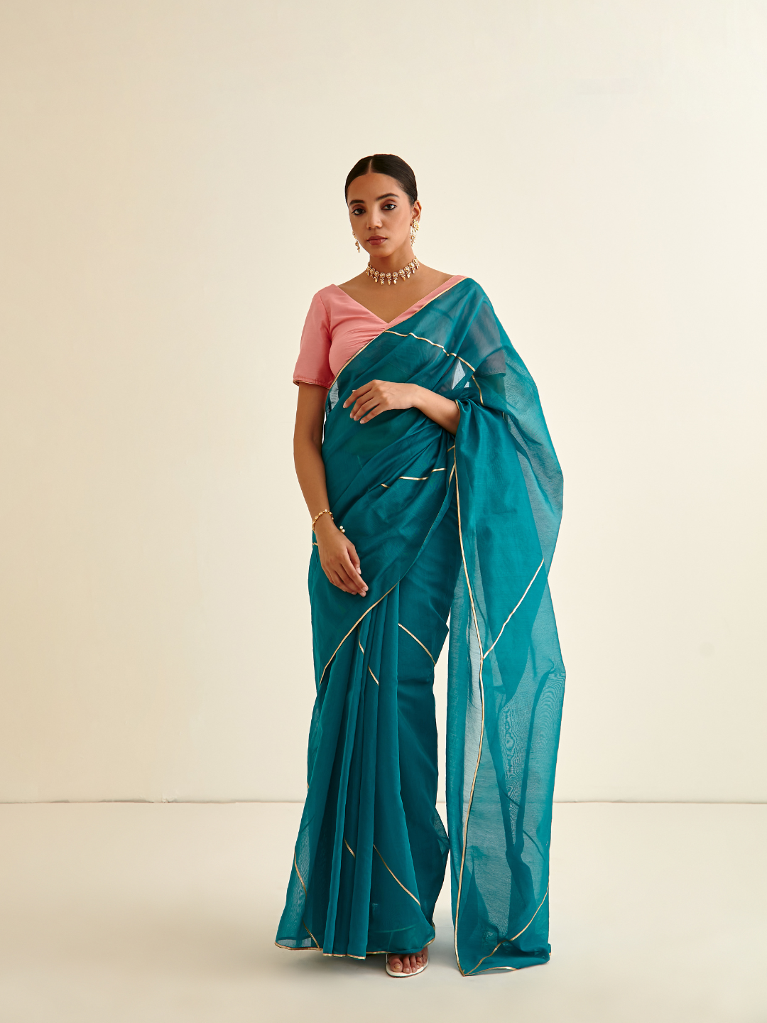 Banarasi woven sari with Gota Patti Highlights - Dark cyan