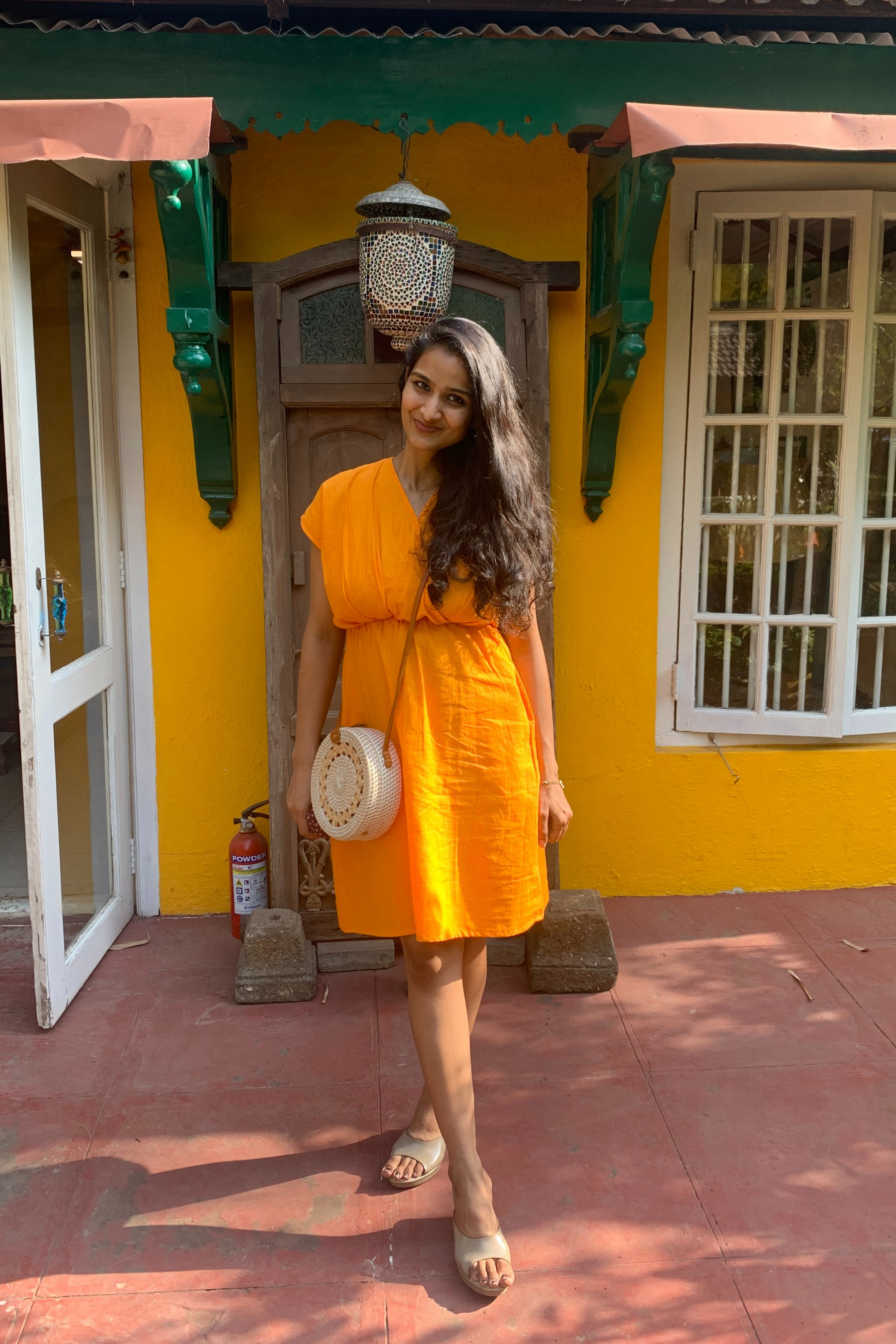 Overlapping pleated front mini dress-Oriole Orange