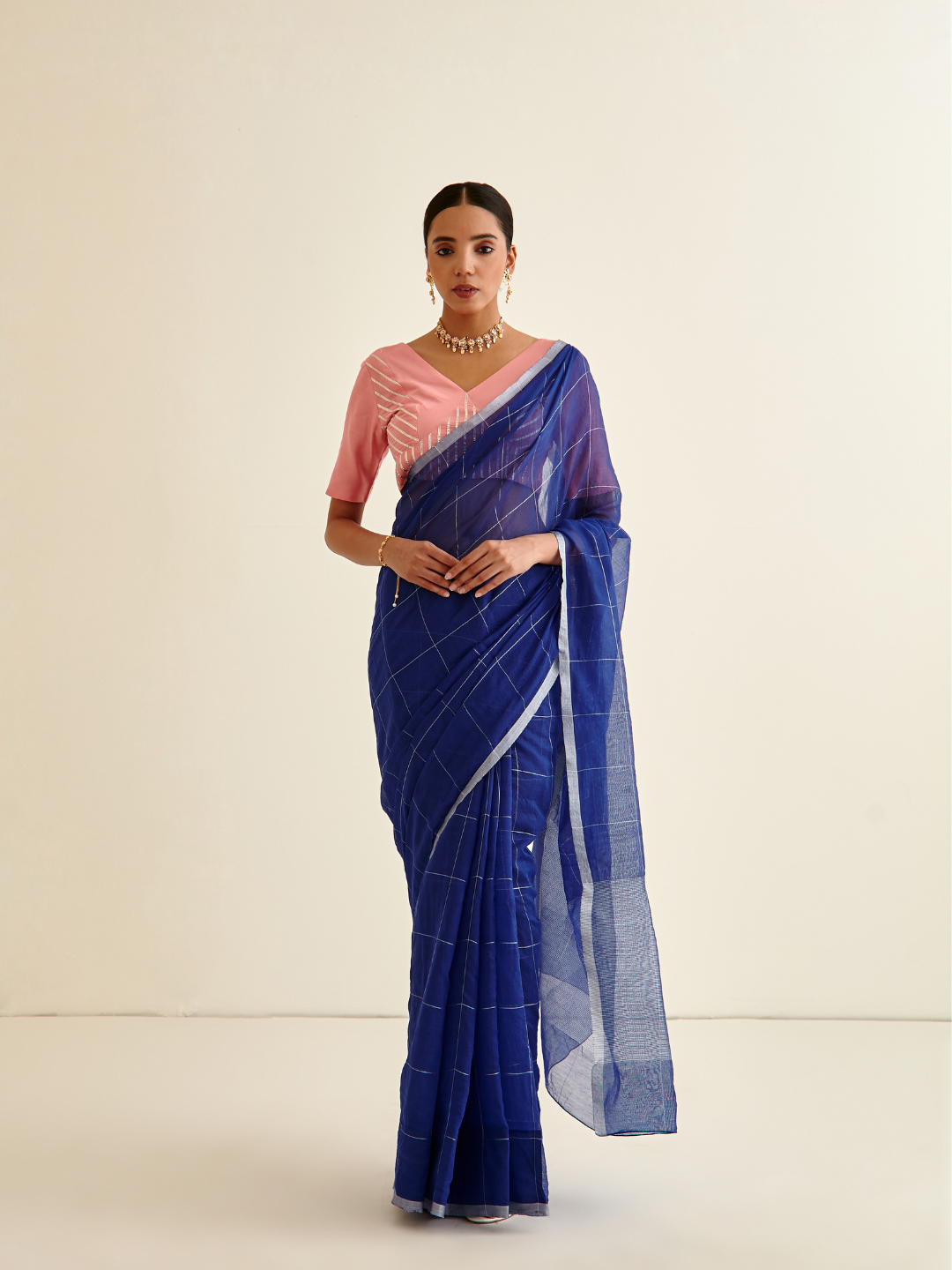 Banarasi Woven Contrasting coral pink border sari- Dark indigo