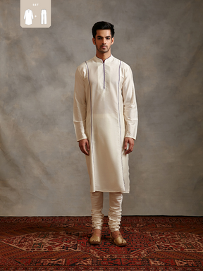 Banarasi straight kurta with contrasting detail paired with churidar- Ivory