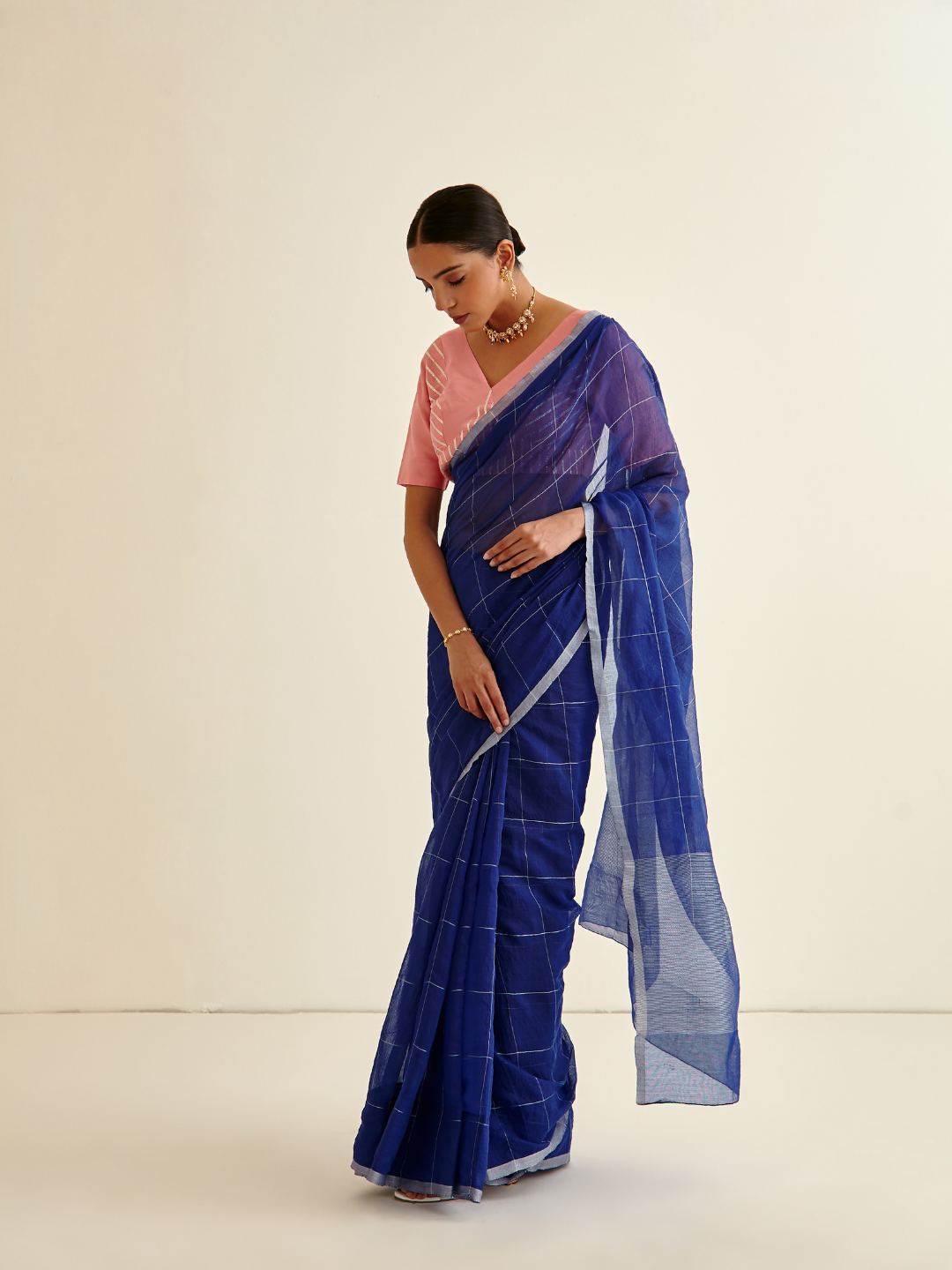 Banarasi Woven Contrasting coral pink border sari- Dark indigo