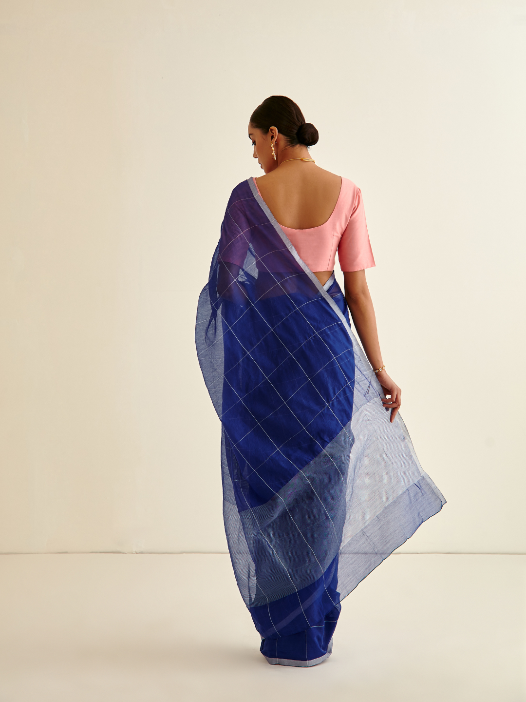 Banarasi Woven Contrasting coral pink border sari- Dark indigo