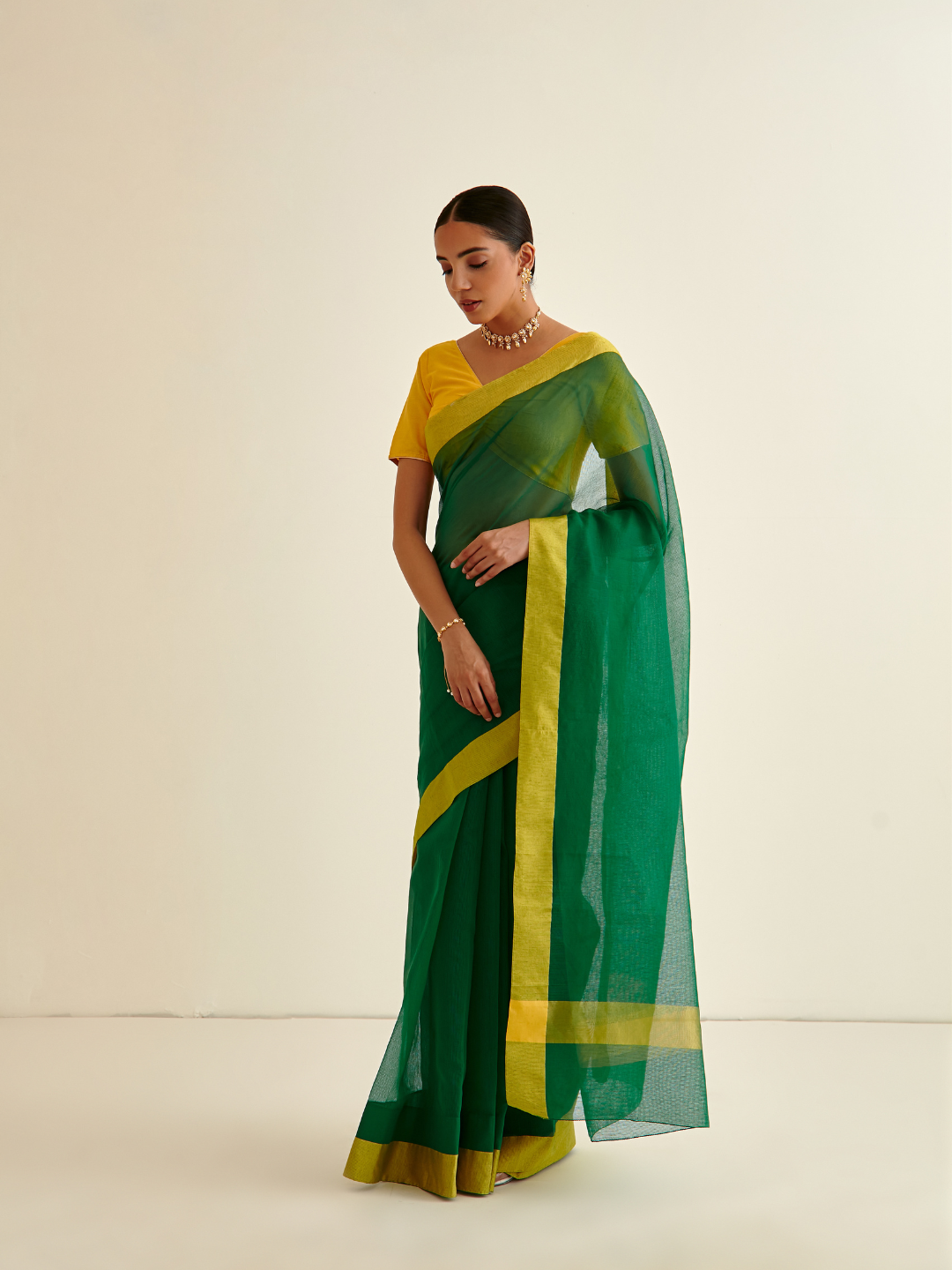 Banarasi woven sari with contrasting border- Slimy Green