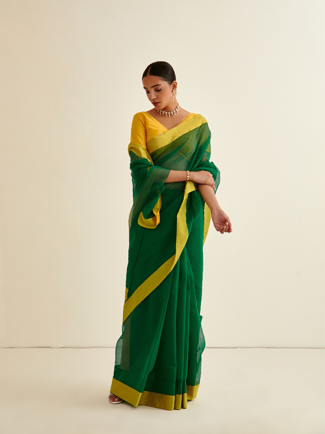 Banarasi woven sari with contrasting border- Slimy Green