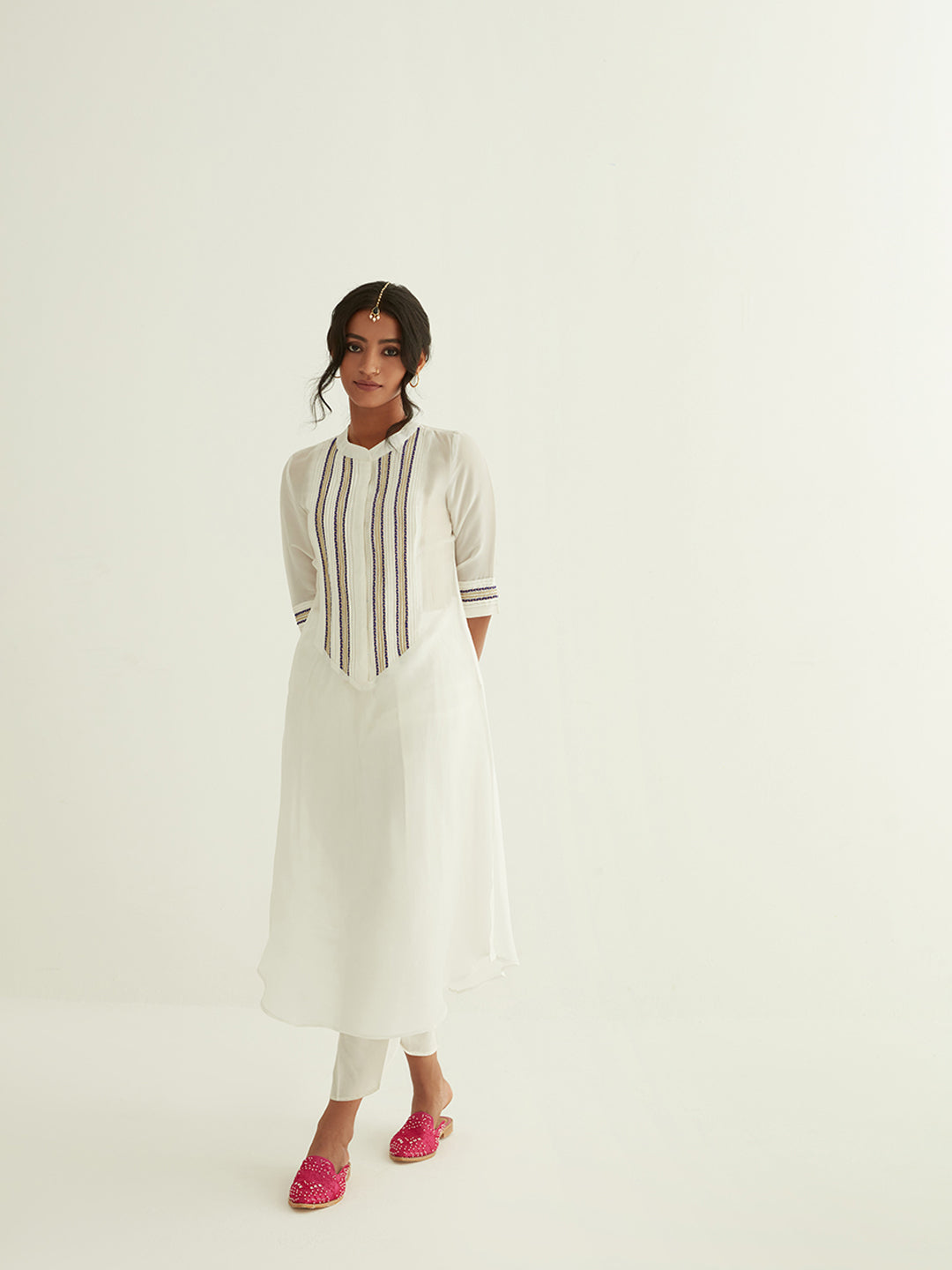 Straight banarasi kurta with a highlighted long placket with tulip pants