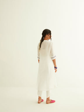 Straight banarasi kurta with a highlighted long placket with tulip pants