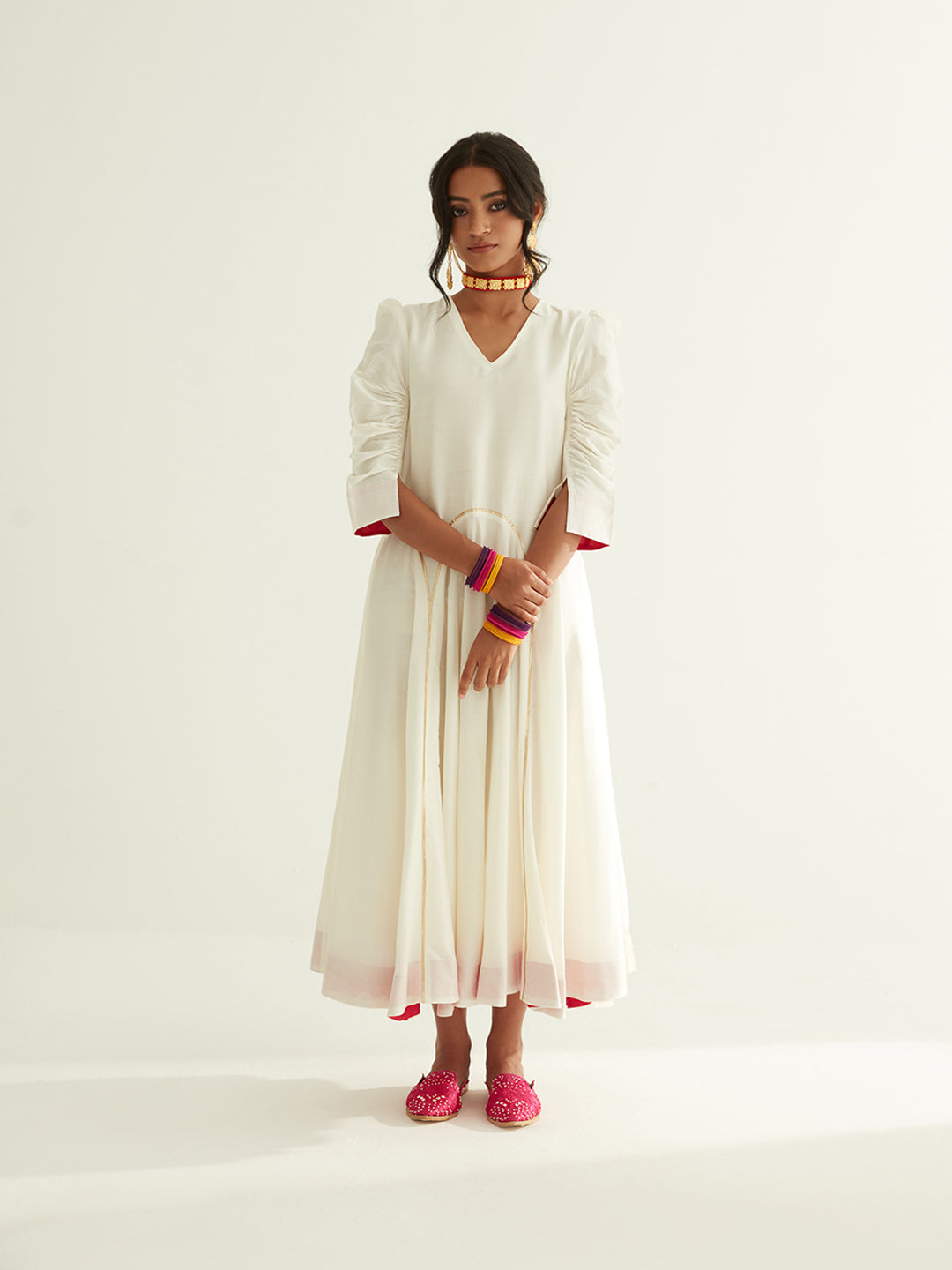Circular panelled dress highlighted with Gota patti