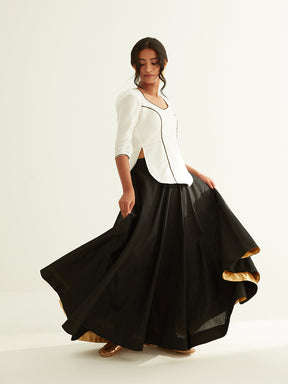 Short kurti with pointed U-neck paired with circular skirt