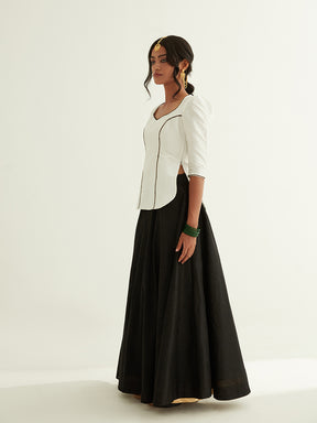 Short kurti with pointed U-neck paired with circular skirt