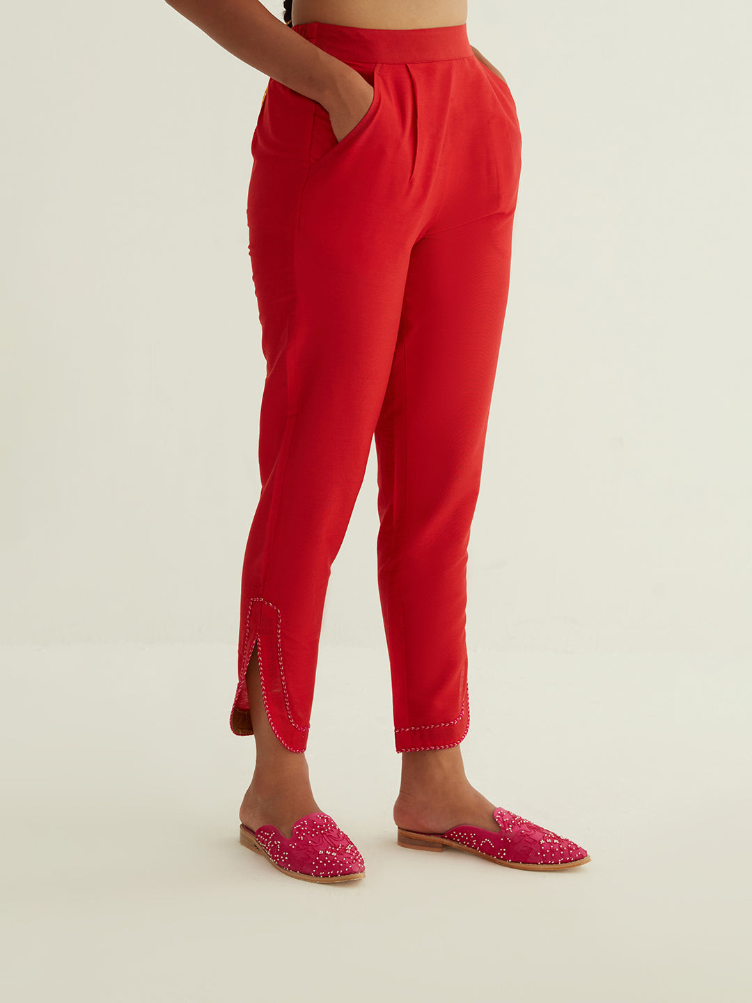 Curved hem pants highlighted with lace