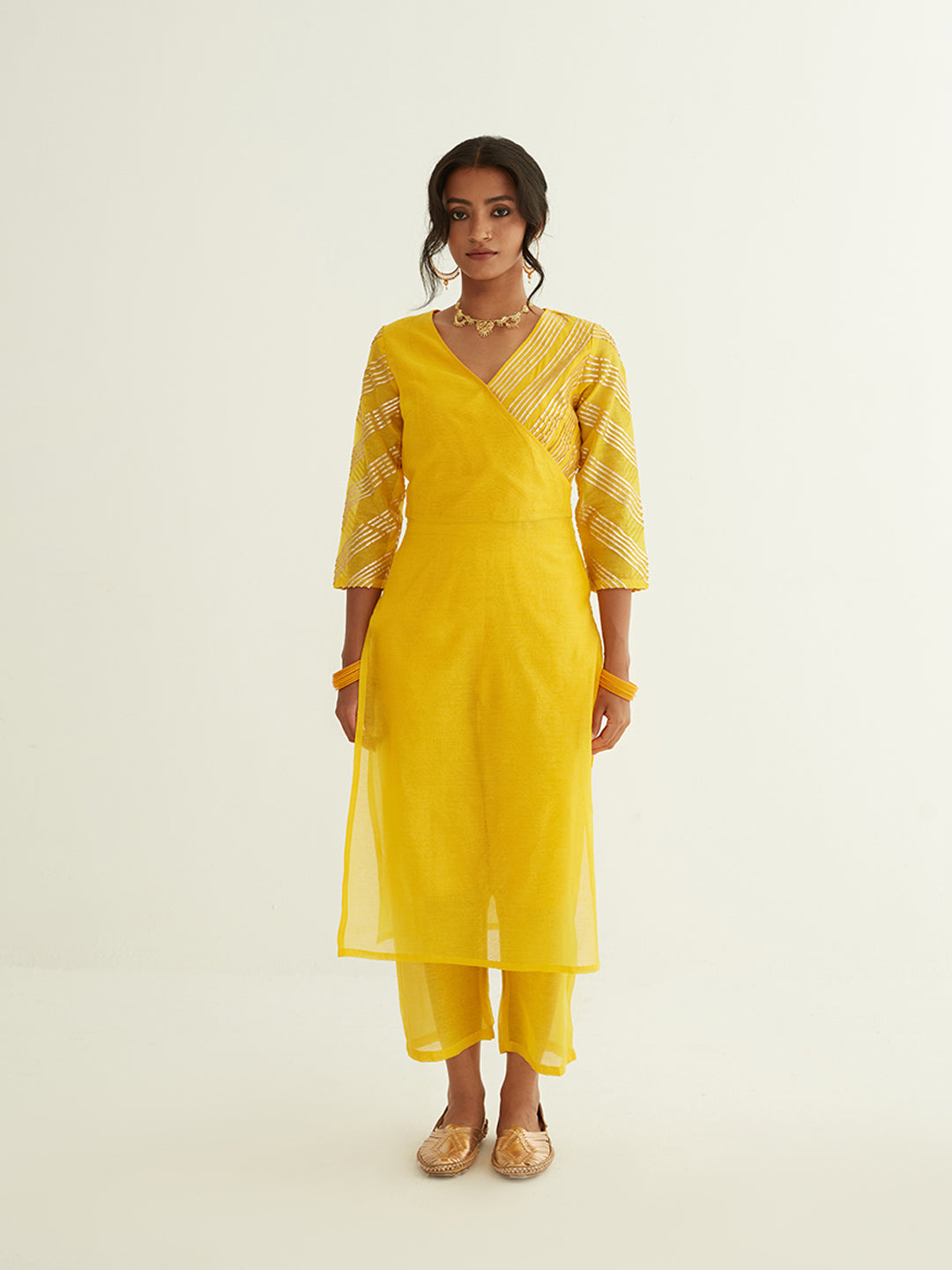 Overlapped neckline chanderi kurta highlighted with Gota Patti