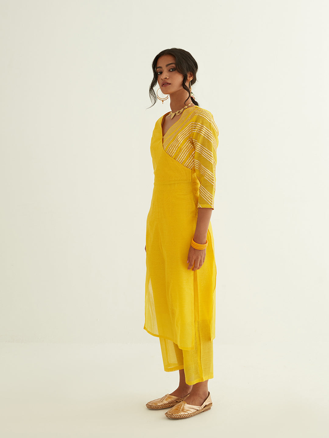 Overlapped neckline chanderi kurta highlighted with Gota Patti