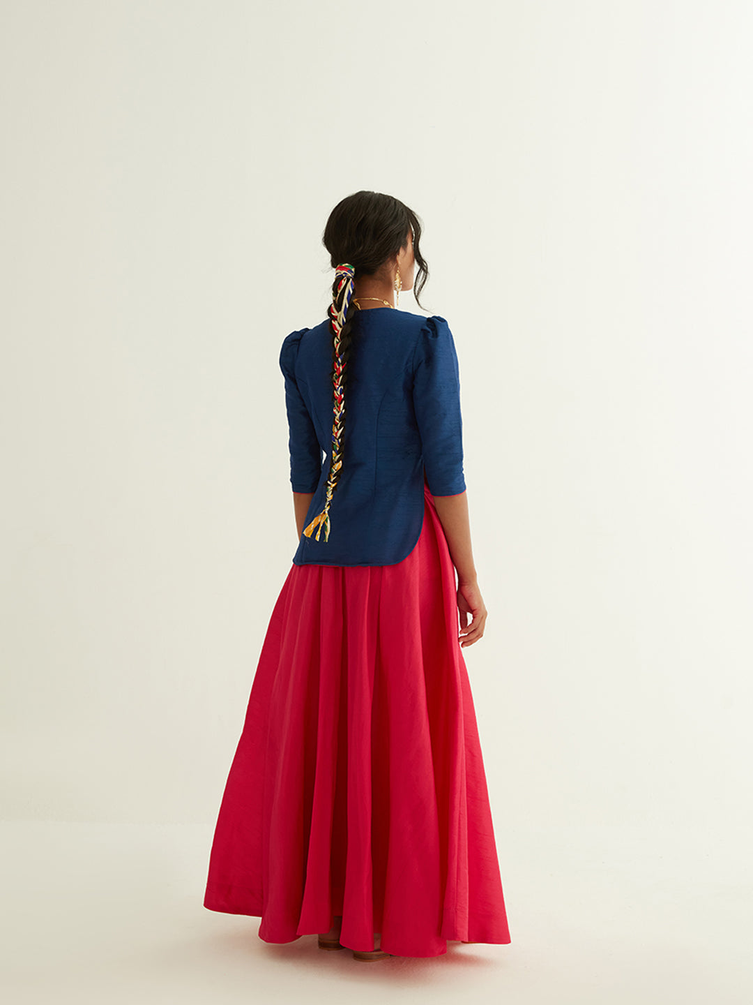 Short kurti with pointed U-neck paired with circular skirt