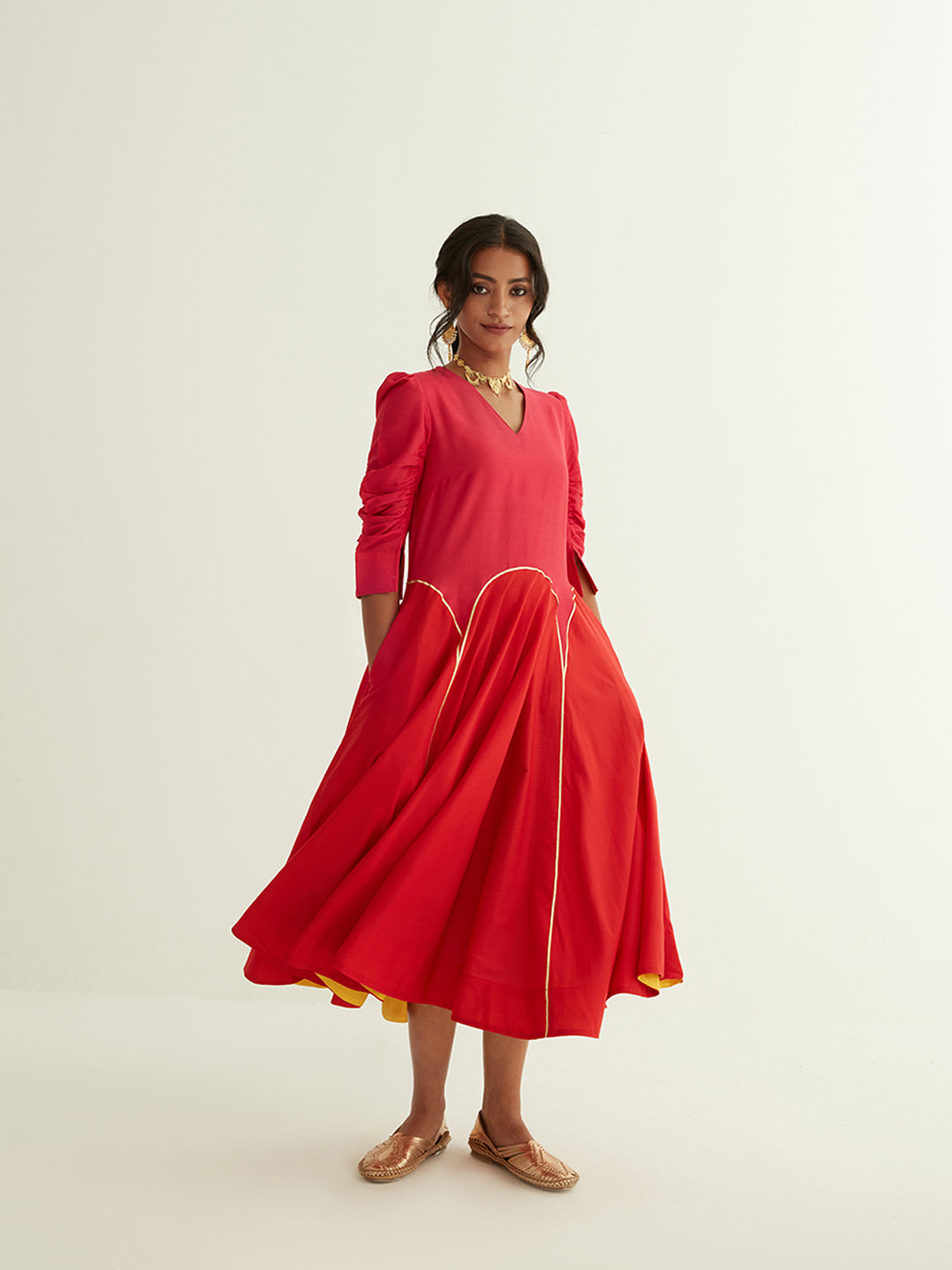 Circular panelled dress highlighted with Gota patti