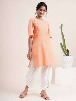Peach Raglan sleeved kurta with contrast piping