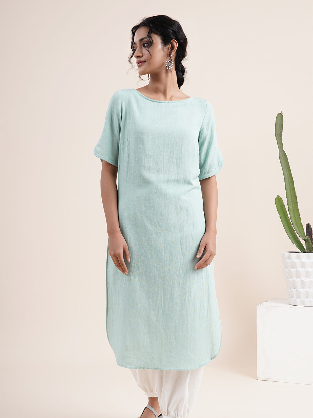 Mint Green Kurta with slit sleeves paired with Pathani pants