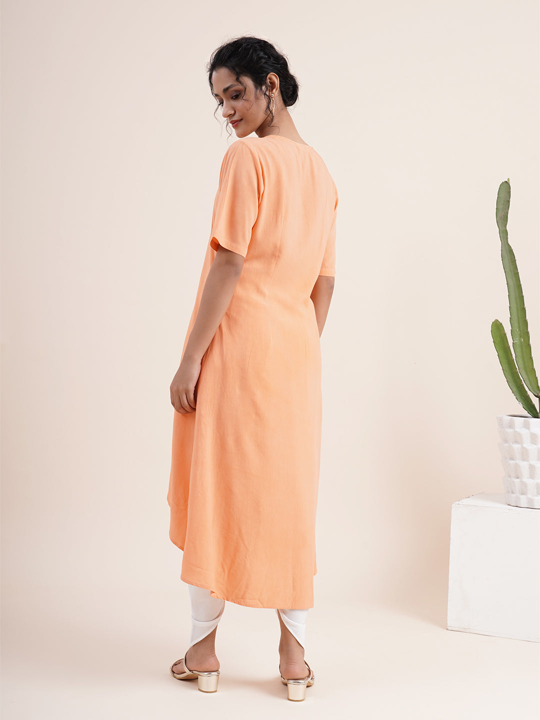 Peach Kurta with pleat sewn from neckline