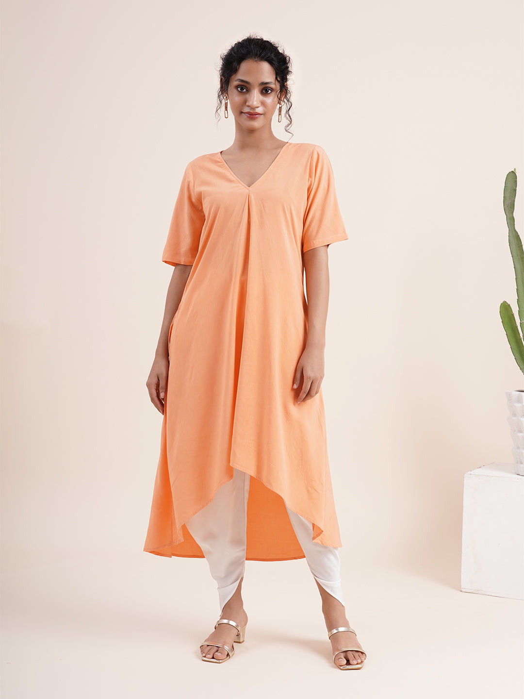 Peach Kurta with pleat sewn from neckline
