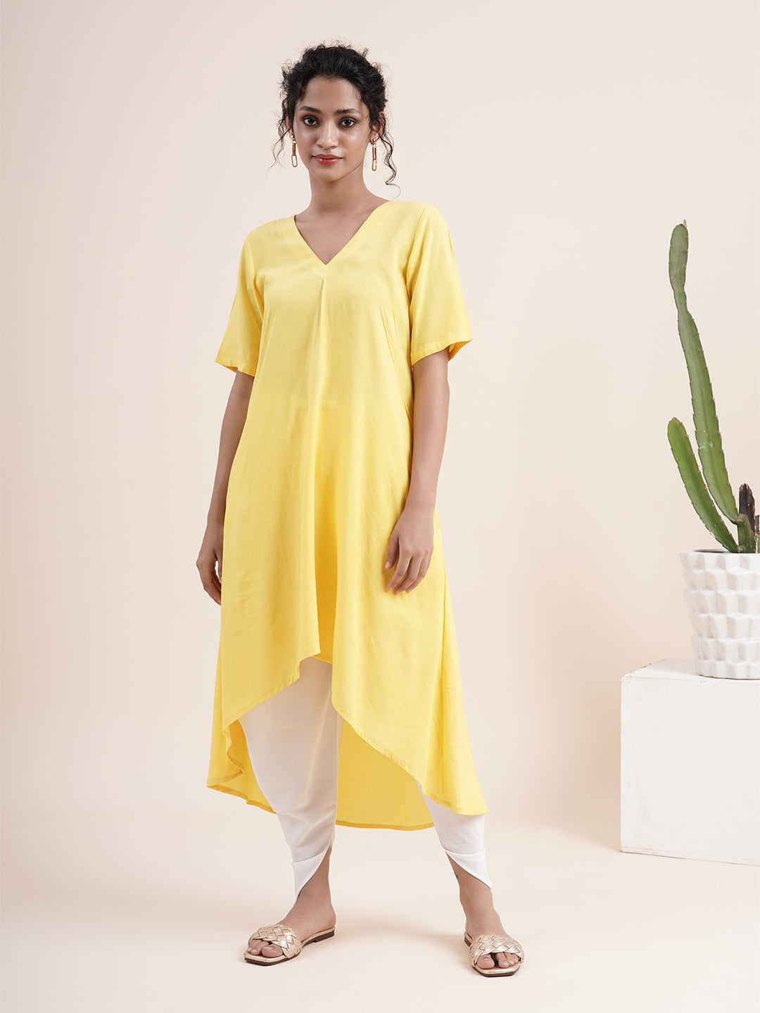 Yellow Kurta with pleat sewn from neckline