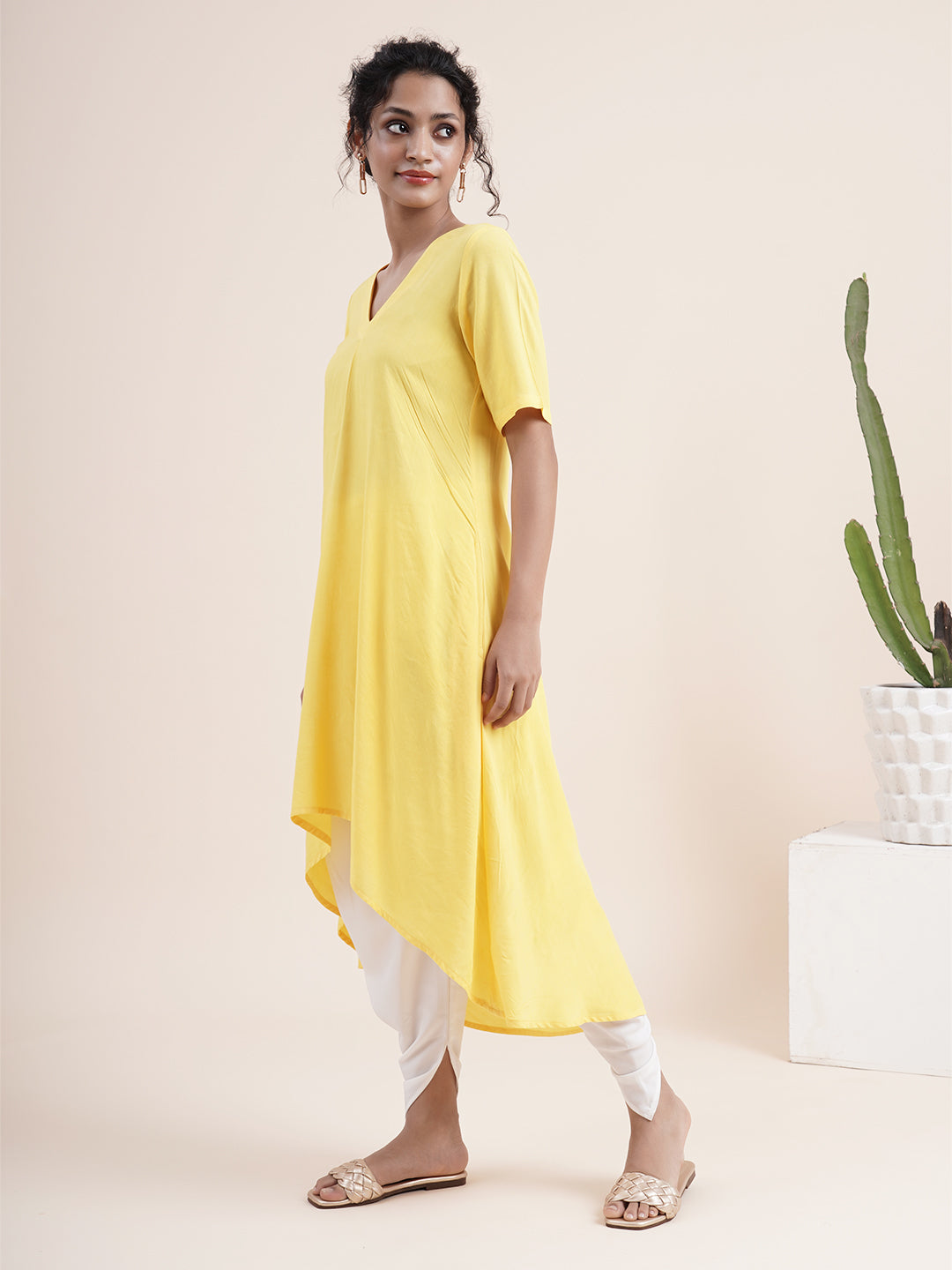 Yellow Kurta with pleat sewn from neckline