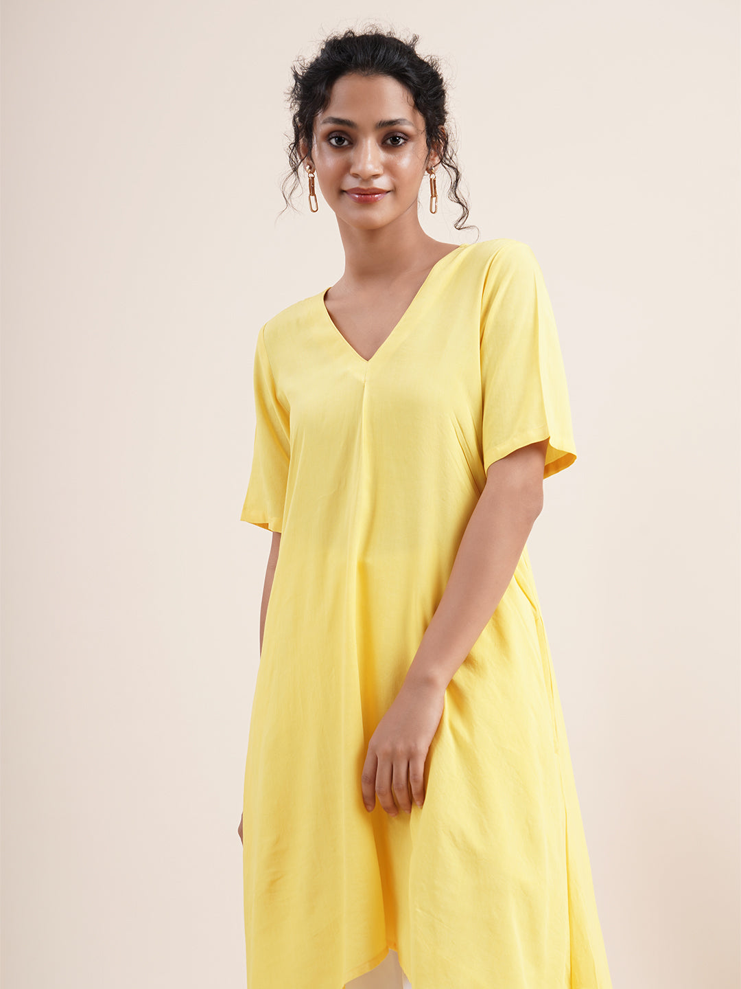 Yellow Kurta with pleat sewn from neckline