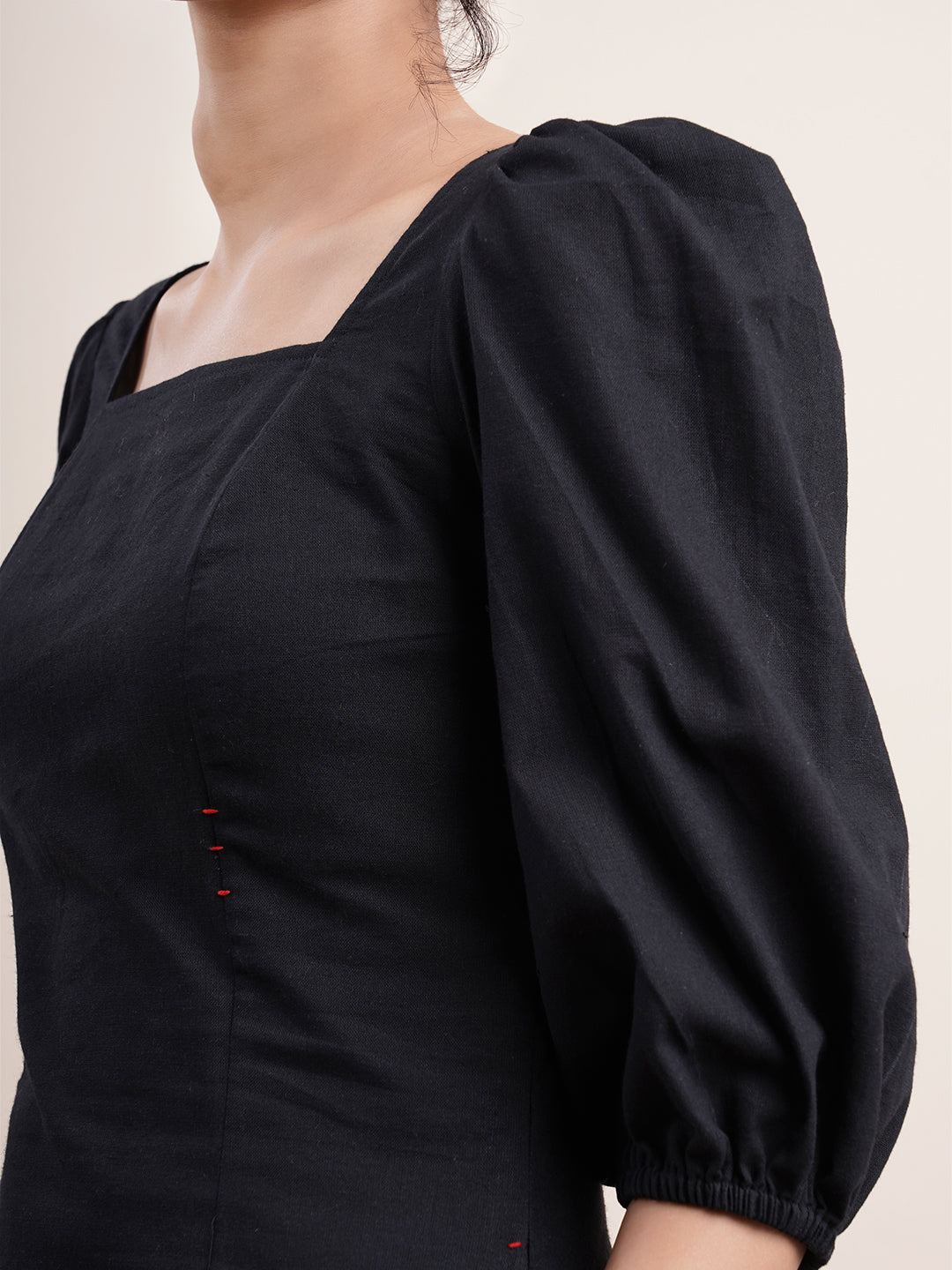 Black square neck dress with bishop sleeves