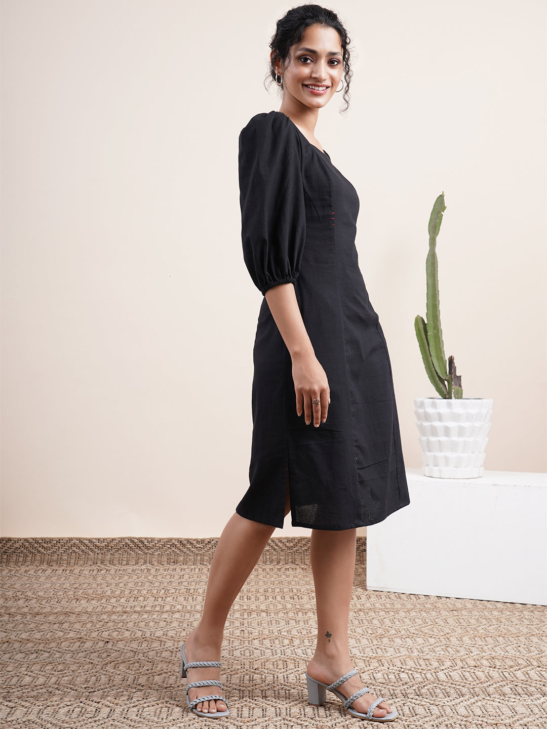 Black square neck dress with bishop sleeves