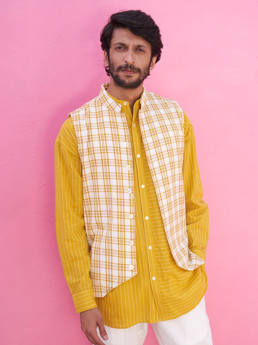 Yellow mandarin collar shirt kurta with plaid checks jacket and straight pants