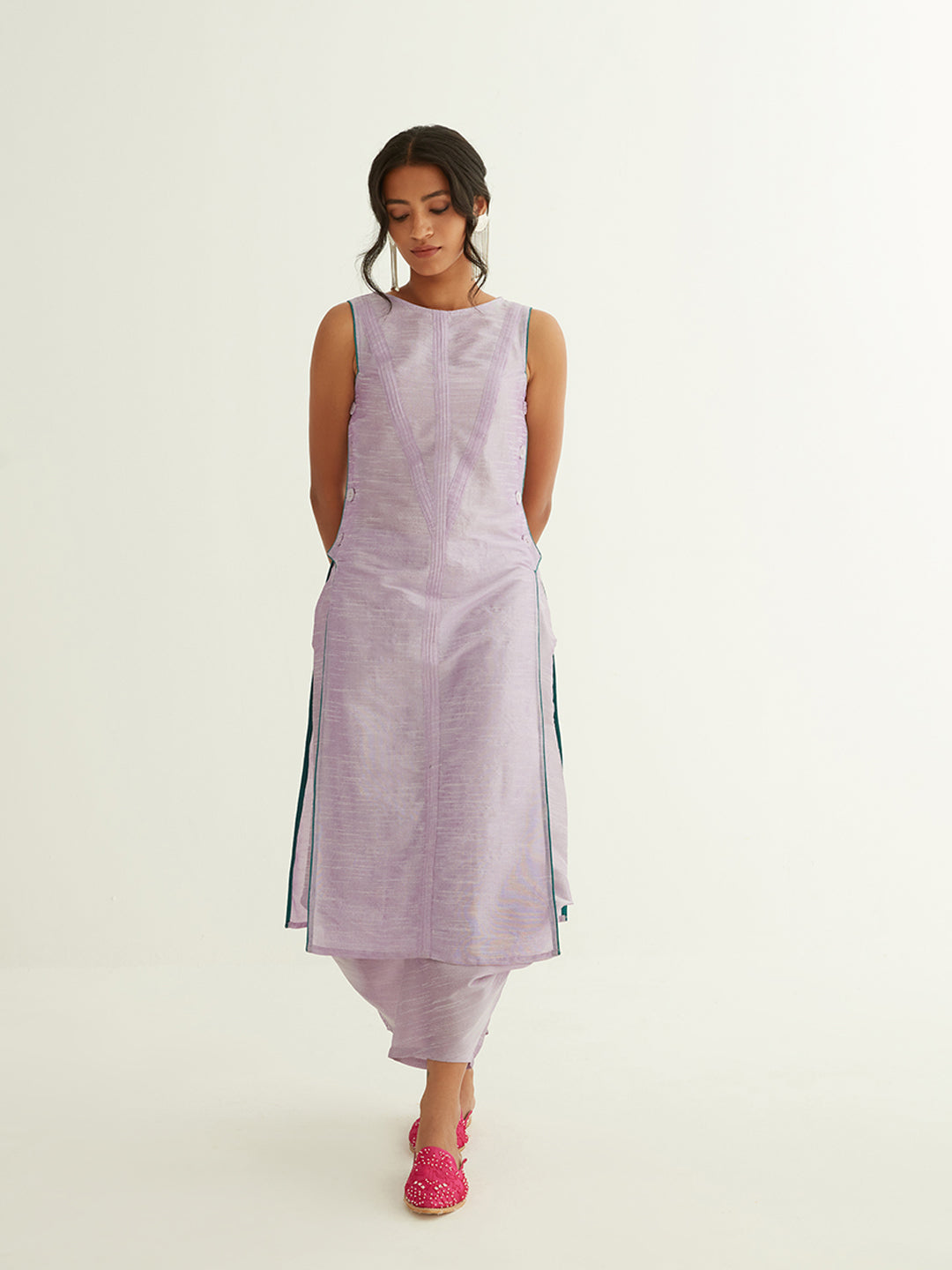 Straight banarasi pintuck kurta paired with pleated pants