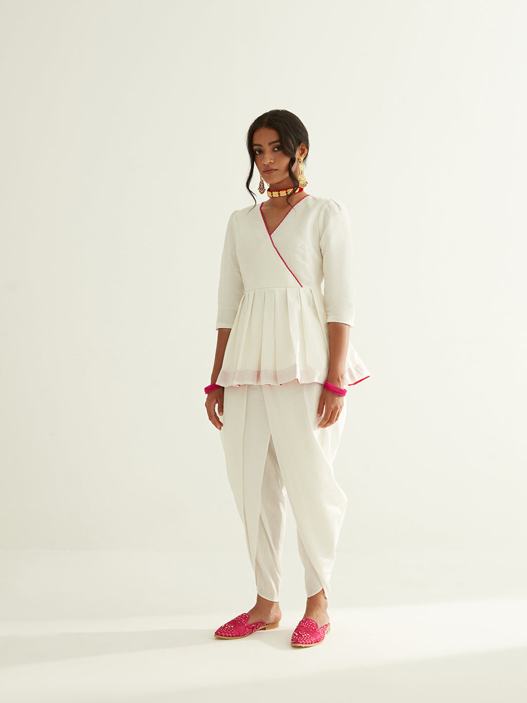 Short banarasi pleated top with puff sleeves paired with tulip dhoti pants