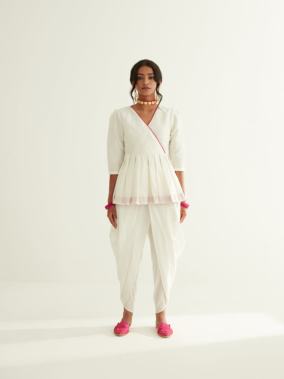 Short banarasi pleated top with puff sleeves paired with tulip dhoti pants