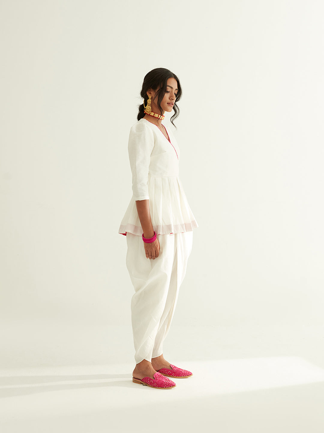 Short banarasi pleated top with puff sleeves paired with tulip dhoti pants
