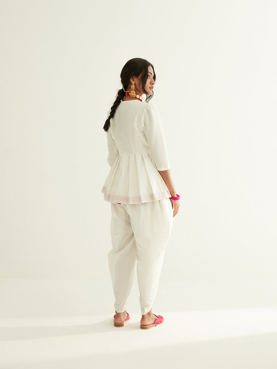 Short banarasi pleated top with puff sleeves paired with tulip dhoti pants