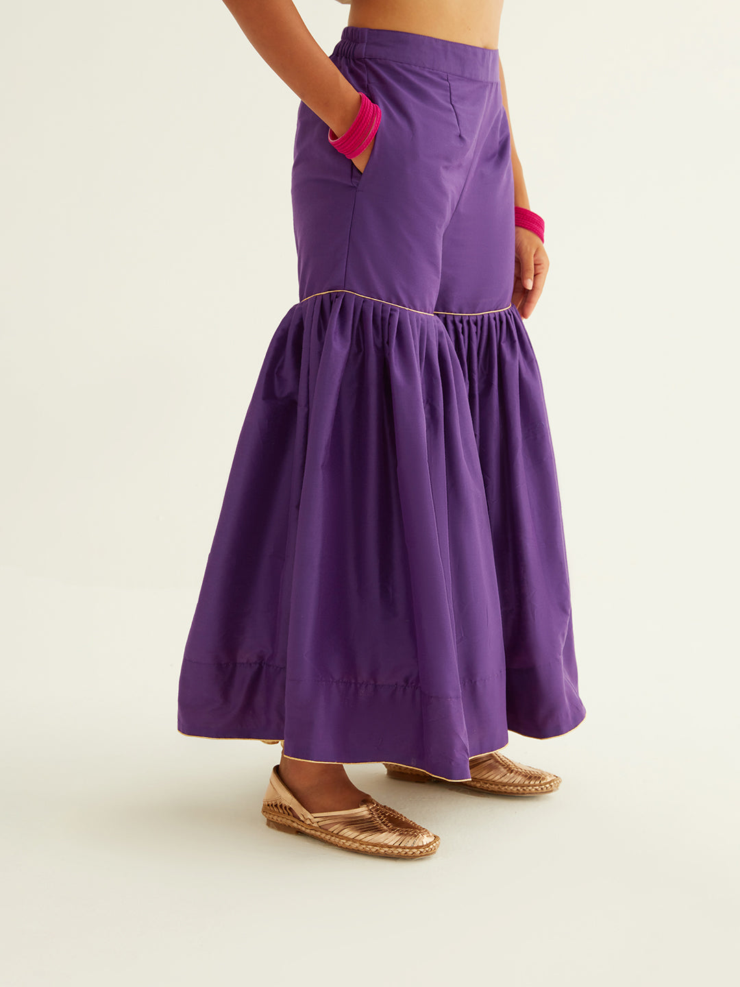 Straight short kurti with princess seam highlights paired with sharara pants