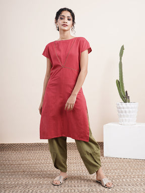 Maroon Drop shoulder kurta paired with overlapped hem pants