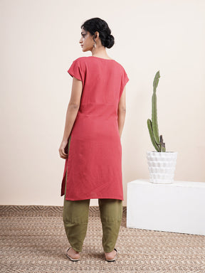 Maroon Drop shoulder kurta paired with overlapped hem pants