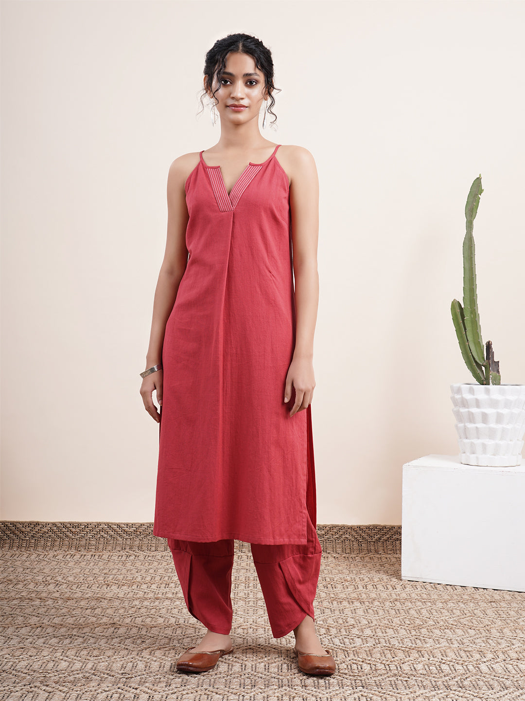 Maroon Kurta paired with overlapped hem pants