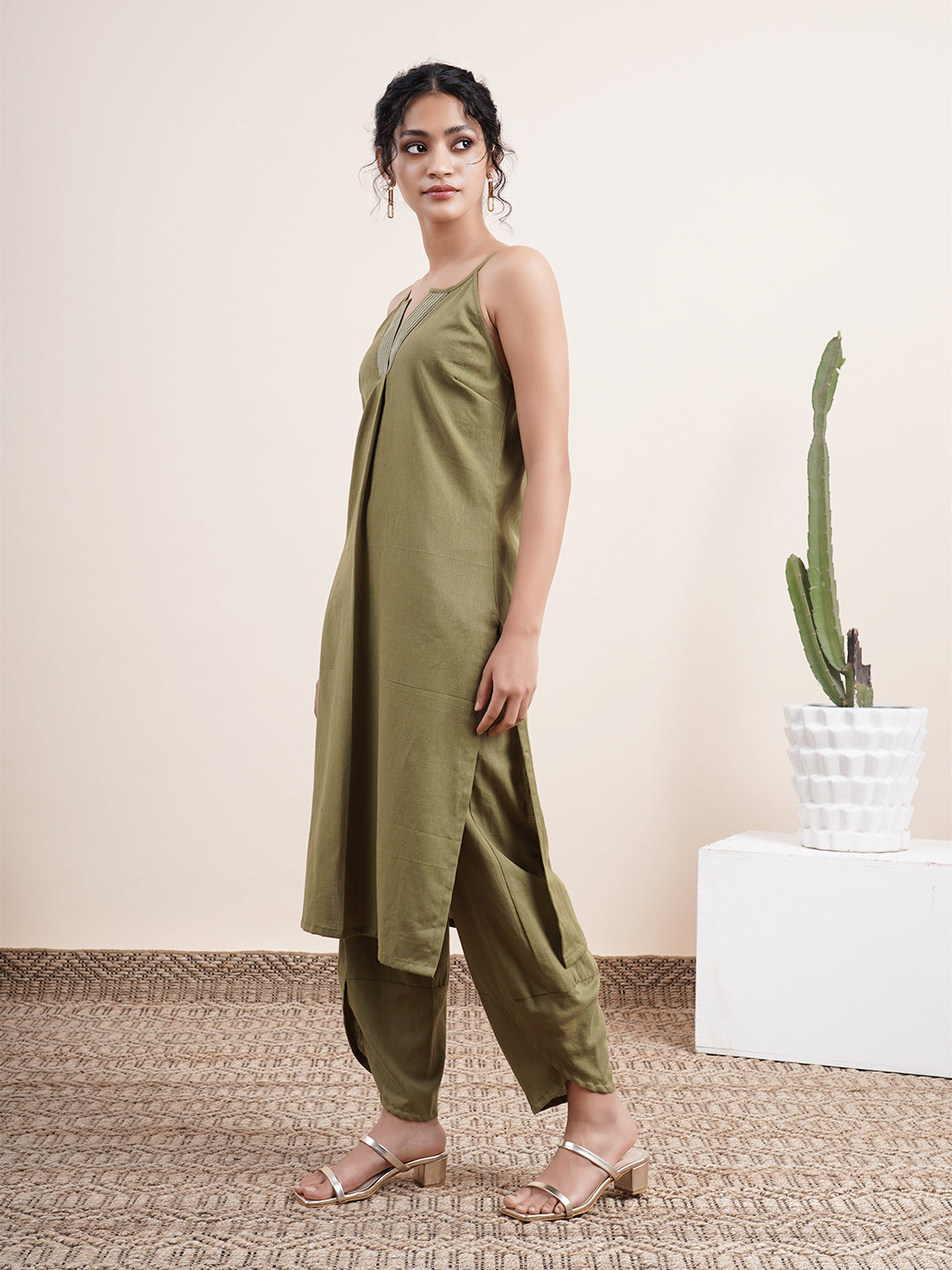 Olive Kurta paired with overlapped hem pants