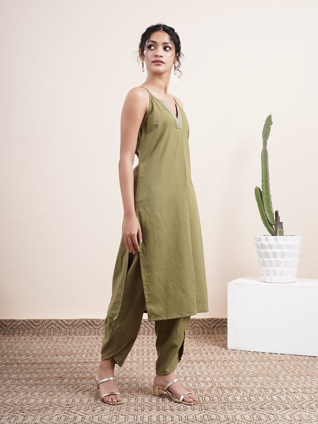 Olive Kurta paired with overlapped hem pants